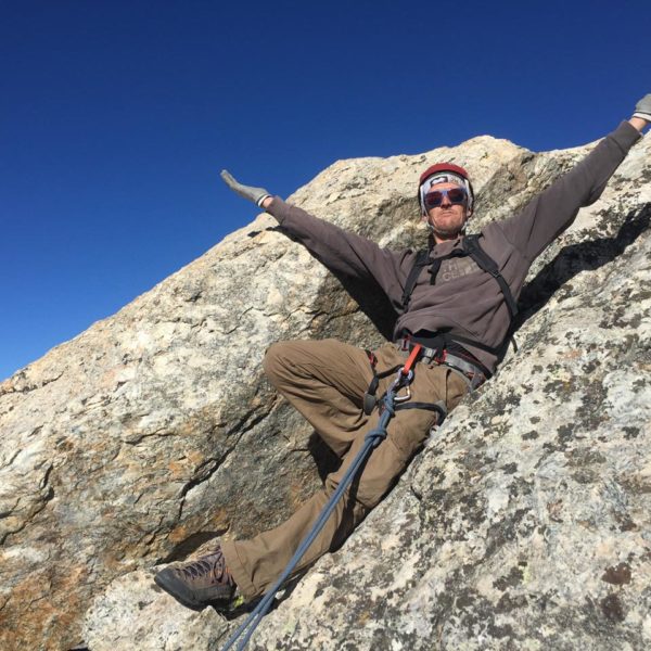 Benoit reveling in a glorious day on the Upper Exum Ridge.