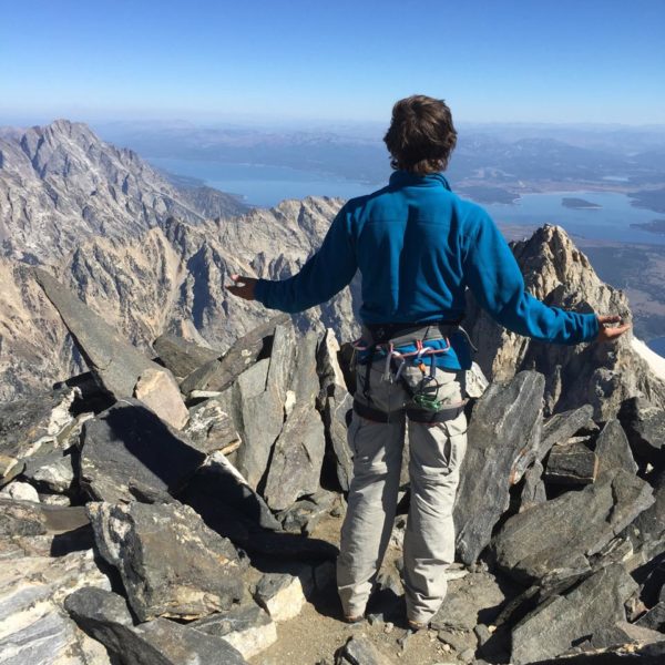 Todd communes with the universe on the summit of the Enclosure (West Summit of the Grand Teton). This archaeological site was presumed to have been used by Native Americans as a sacred spot for completing the vision quest ritual, a rite of passage ceremony.